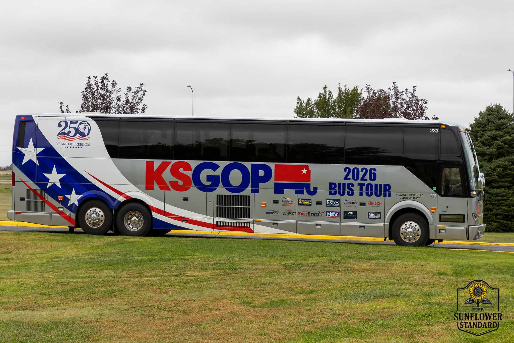 The Kansas Republican Party's 2026 campaign bus parked at Colby Community College